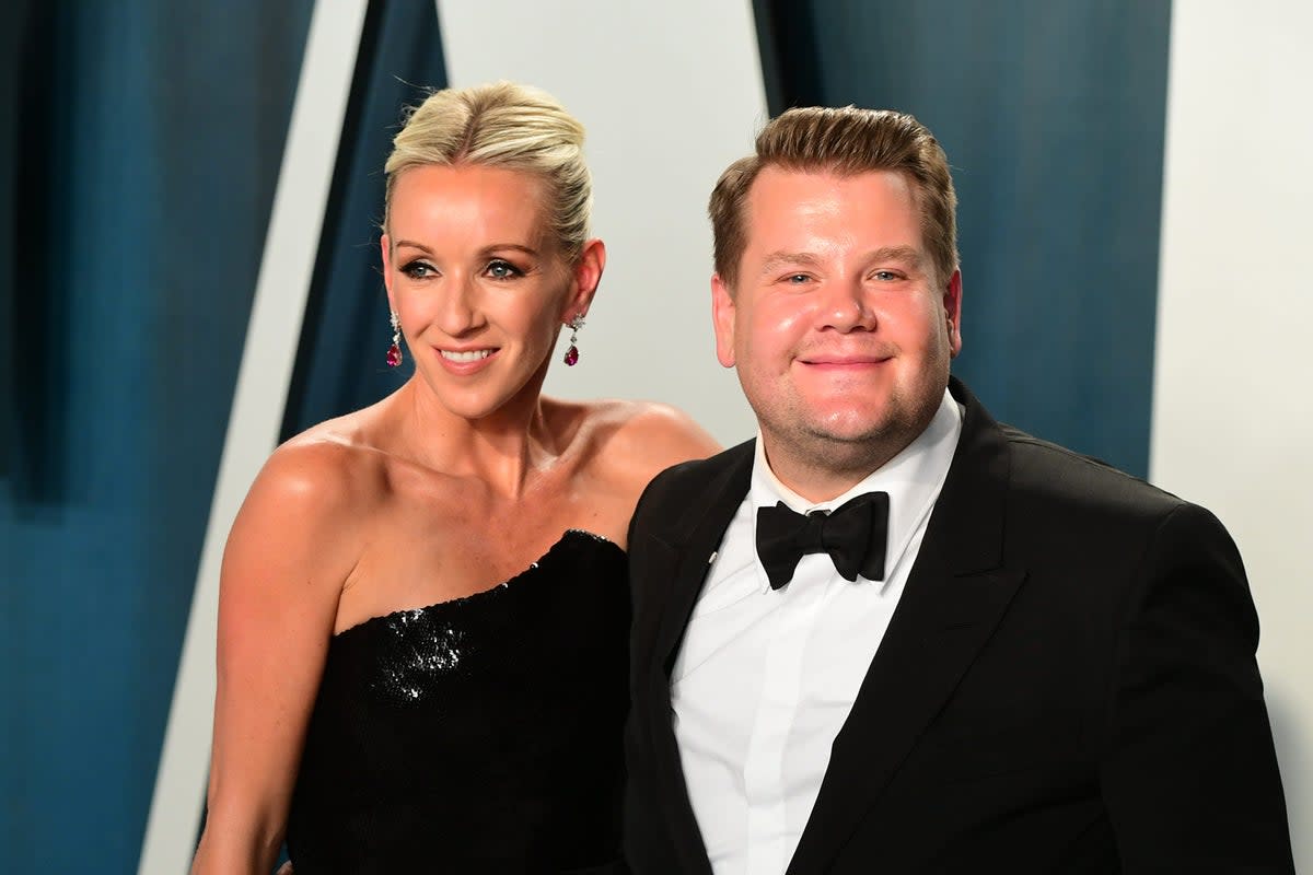 Julia Carey (left) with her husband James Corden (PA) (PA Archive)