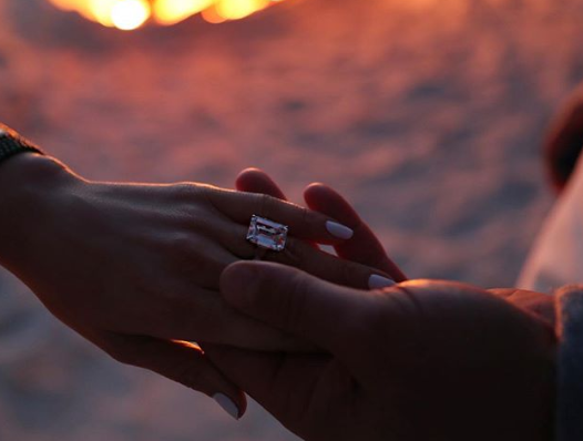 <p>In March 2019, JLo and ARod announced they were engaged, sharing on Instagram a picture of their hands holding at sunset, along with the massive engagement ring.<br>Andrew Brown, President of WP Diamonds, told E! News he estimated estimated the huge sparkler to be around $1 million ($1.4 million AUD).<br>Source: Instagram/Jennifer Lopez </p>