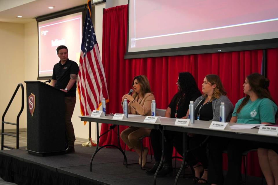 State Sen. Marie Alvarado-Gil, seated at left with microphone, participates in a sexual abuse awareness panel at CSU Stanislaus in Turlock, Calif. on Friday, April 14, 2023.