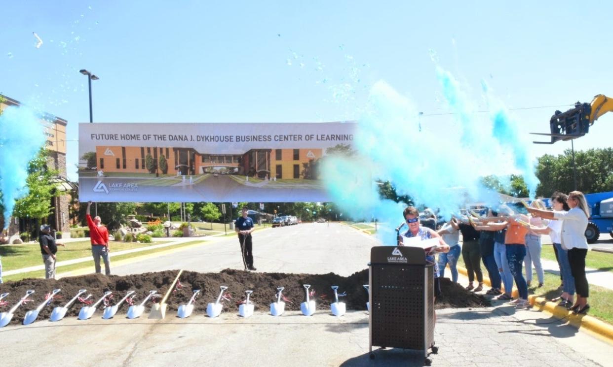 Watertown School Board President Tammy Rieber reads the naming proclamation of the Dana J. Dykhouse Business Center of Learning at Lake Area Technical College Tuesday.