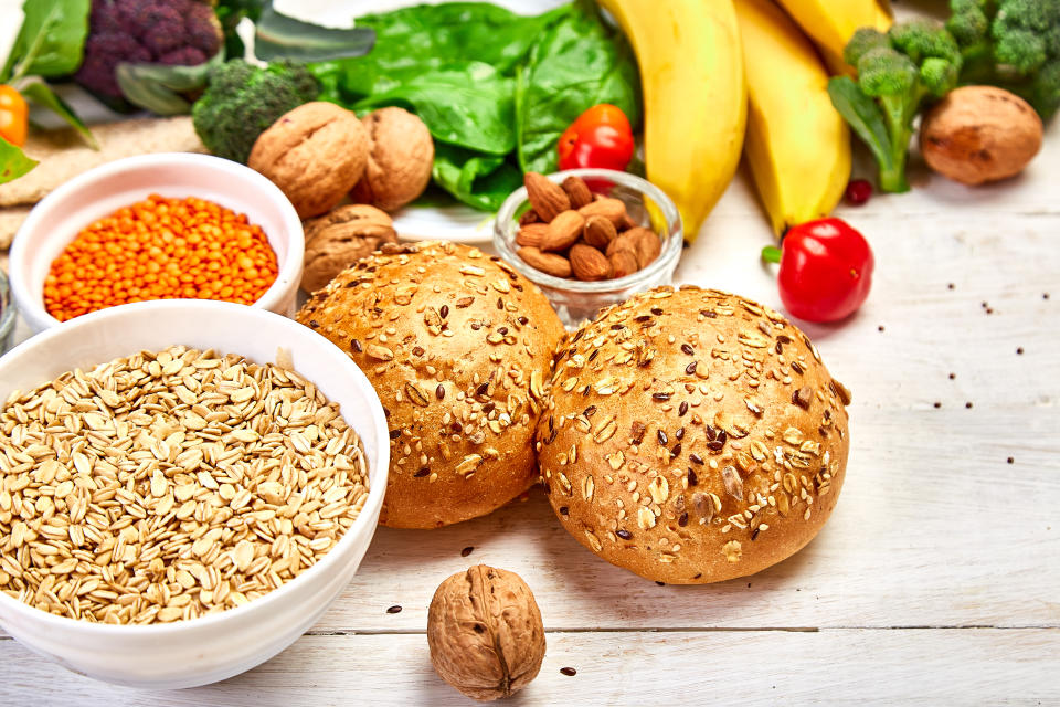 High Fiber Foods on white wooden background, Healthy balanced dieting concept. Top view, flat lay, copy space.