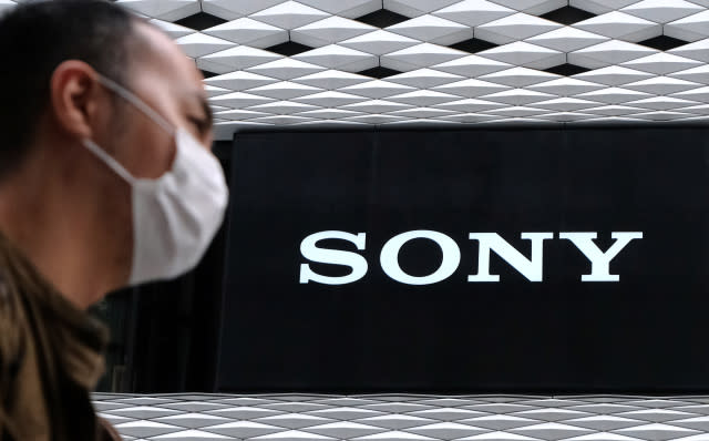 A man walks past the logo of Japans Sony displayed at the company's showroom in Tokyo on October 28, 2020. (Photo by Kazuhiro NOGI / AFP) (Photo by KAZUHIRO NOGI/AFP via Getty Images)