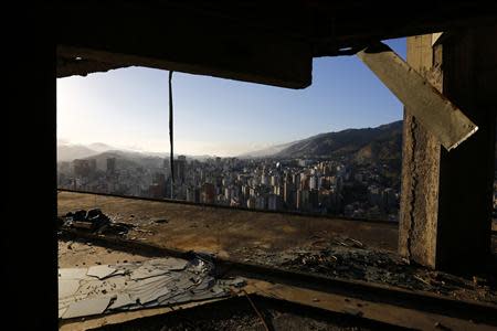 The city is seen from the 44th floor of the "Tower of David" skyscraper in Caracas February 9, 2014. REUTERS/Jorge Silva