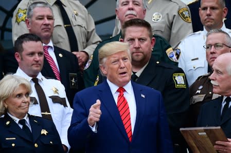 U.S. President Donald Trump meets with sheriffs from across the country on the South Lawn of the White House in Washington