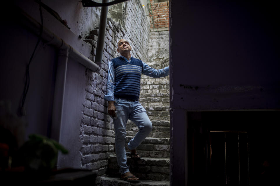 Muhammad Nasir Khan, who was shot by a Hindu mob during the February 2020 communal riots, is seen inside his home in North Ghonda, one of the worst riot affected neighborhood, in New Delhi, India, Friday, Feb. 19, 2021. As the first anniversary of bloody communal riots that convulsed the Indian capital approaches, Muslim victims are still shaken and struggling to make sense of their struggle to seek justice. (AP Photo/Altaf Qadri)