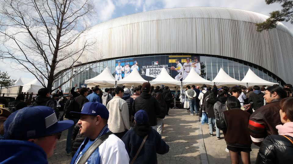 Fans make their way to the stadium prior to the 2024 Seoul Series game between the Dodgers and the Padres at Gocheok Sky Dome on March 20. - Chung Sung-Jun/Getty Images