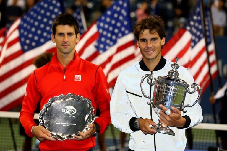 Golden days: Rafael Nadal poses with the US Open trophy next to Novak Djokovic after the 2013 final in New York (MATTHEW STOCKMAN)