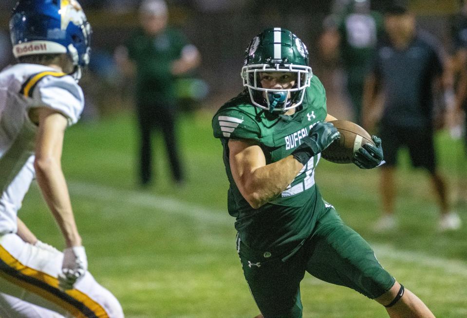 Manteca's  Blake Nichelson on a TD run against Turlock on Sept. 9. Manteca led 35-22 at the half.