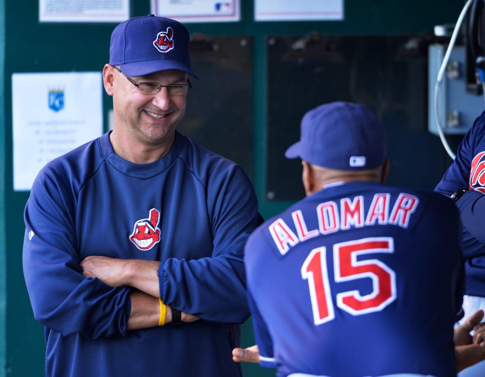 Cleveland manager Terry Francona talks with coach Sandy Alomar, Jr. between games of a doubleheader vs the Royals, Sunday, April 28, 2013, in Kansas City, Mo.