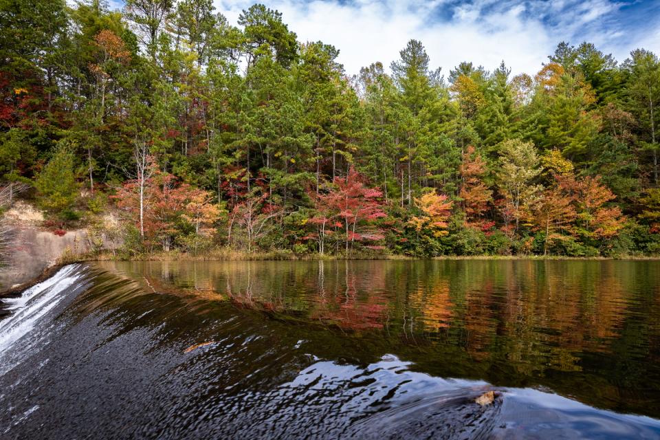Some light fall color can be seen at the Lake Julia spillway in DuPont State Recreational Forest, Oct. 25, 2018. 