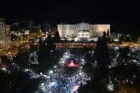 Greeks gather in front of the parliament in Athens on July 5, 2015, after results showed the No vote had won the crucial bailout referendum