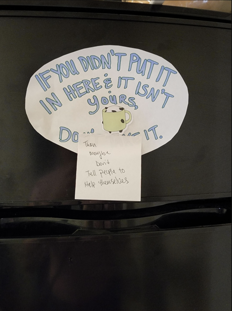 The first sign says "if you didn't put it in here and it isn't yours, don't take it" and a Post-It note placed on top of it says "then maybe don't tell people to help themselves"