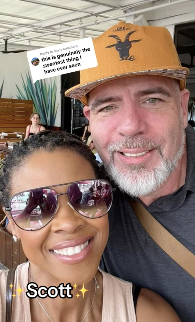 Selfie of a smiling man and woman, labeled "Scott," in a casual setting. The man has a beard and wears a cap, and the woman wears sunglasses. Text reads "this is genuinely the sweetest thing I have ever seen."