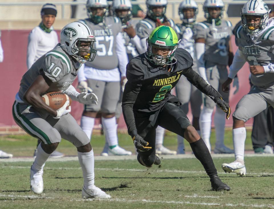 Lake Minneola's Ethon Cole (2) pursues Miami Central’s Robert McMinn (10) in 2020 Class 6A state championship game at Bobby Bowden Field at Doak Campbell Stadium in Tallahassee. Cole will be looked for defensive leadership in 2022. [PAUL RYAN / CORRESPONDENT]