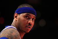 NEW YORK, NY - APRIL 13: Carmelo Anthony #7 of the New York Knicks looks on against the Washington Wizards at Madison Square Garden on April 13, 2012 in New York City. NOTE TO USER: User expressly acknowledges and agrees that, by downloading and/or using this Photograph, user is consenting to the terms and conditions of the Getty Images License Agreement. (Photo by Chris Trotman/Getty Images)