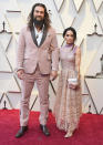 <p>The “Aquaman” star arrived alongside his wife Lisa Bonet in matching pink ensembles by Fendi. <em>[Photo: Getty]</em> </p>