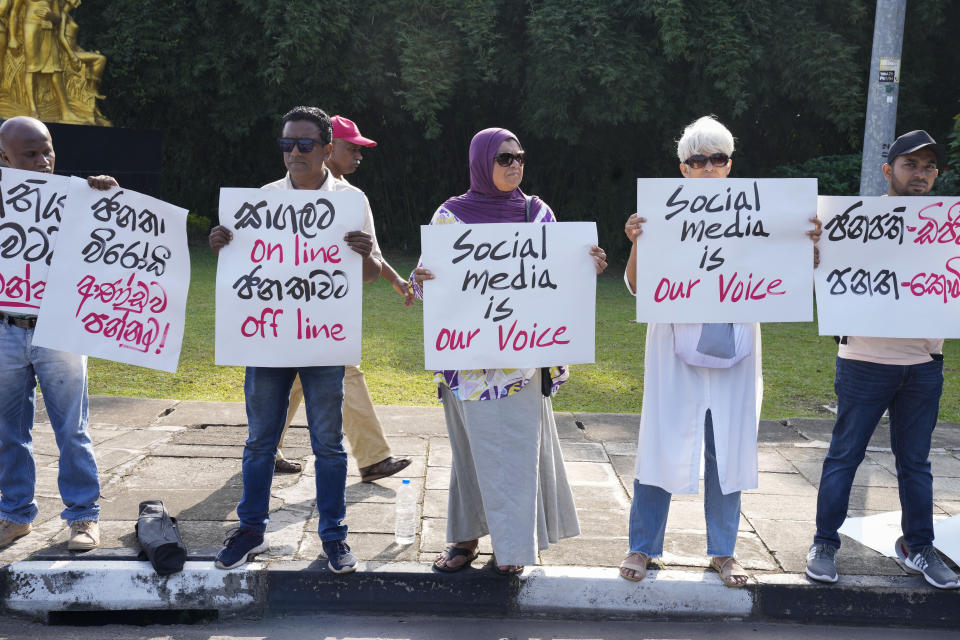 Sri Lankan social media activists hold placards with slogans against the proposed Online Safety Bill during a protest near the Parliament in Colombo, Sri Lanka, Tuesday, Jan. 23, 2024. (AP Photo/Eranga Jayawardena)