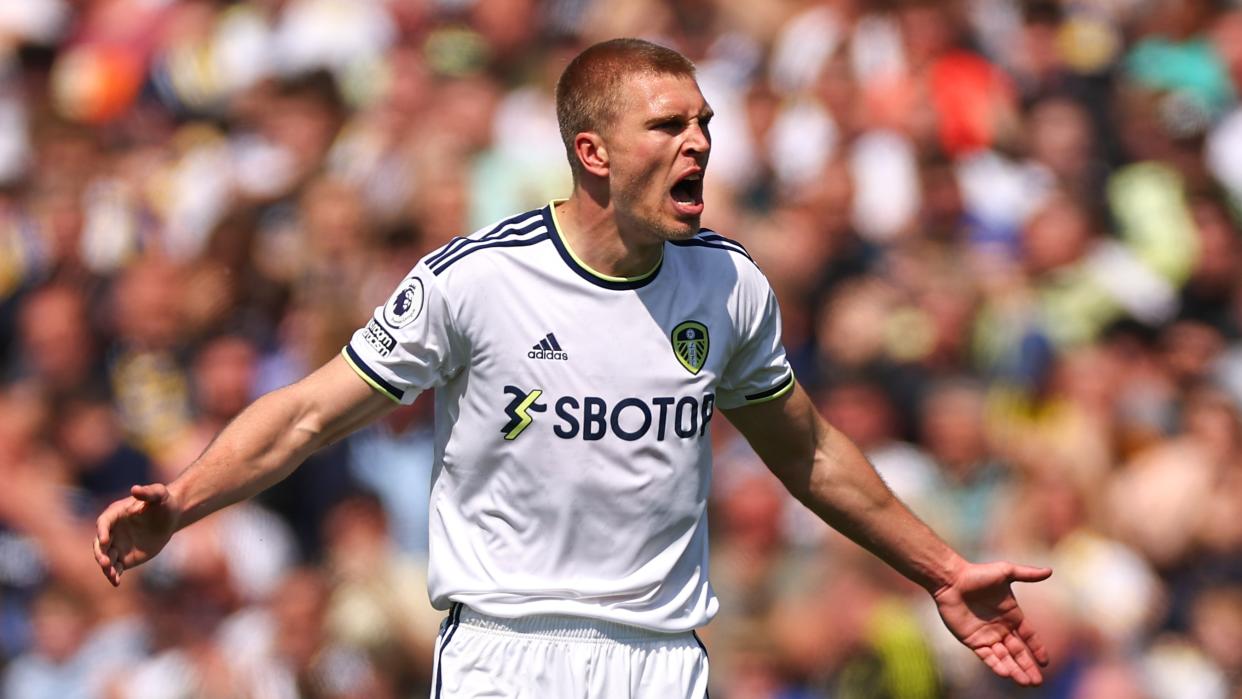   Rasmus Kristensen of Leeds United celebrates after scoring a goal to make it 2-2 during the Premier League match 