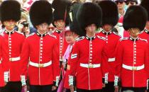 <p>Queen Elizabeth II inspects the Canadian Guard of Honour on Canada Day in 1992 before taking part in celebrations on Parliament Hill in Ottawa. The Queen visited Canada for the 125th anniversary of the country. (Photo by Chris Wilkins/AFP via Getty Images)</p> 