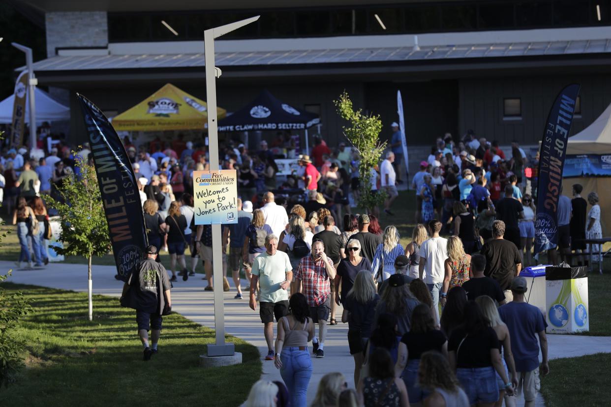 Jones Park is full of music fans Aug. 5, 2022, for Mile of Music. The free music festival marks a decade in 2023 and now has a $2.6 million budget yet doesn't charge an admittance fee.