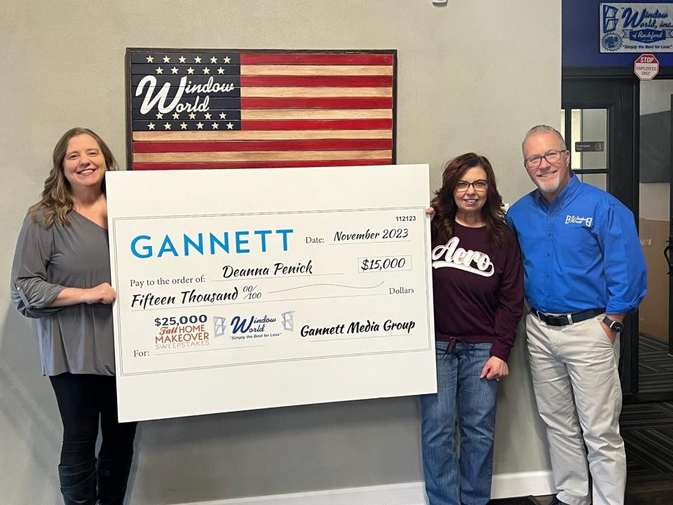 Linda Bressler, account executive at LocaliQ, left, Fall Home Sweepstakes grand prize winner Deanna Penick, and Scott Williamson of Window World of Rockford, pose for a picture Tuesday, Dec. 5, 2023, at Window World.