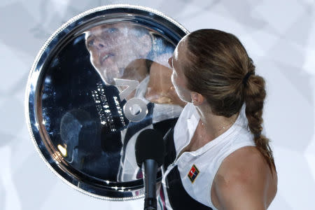 Tennis - Australian Open - Women's Singles Final - Melbourne Park, Melbourne, Australia, January 26, 2019. Czech Republic's Petra Kvitova poses with her trophy after losing her match against Japan's Naomi Osaka. REUTERS/Edgar Su