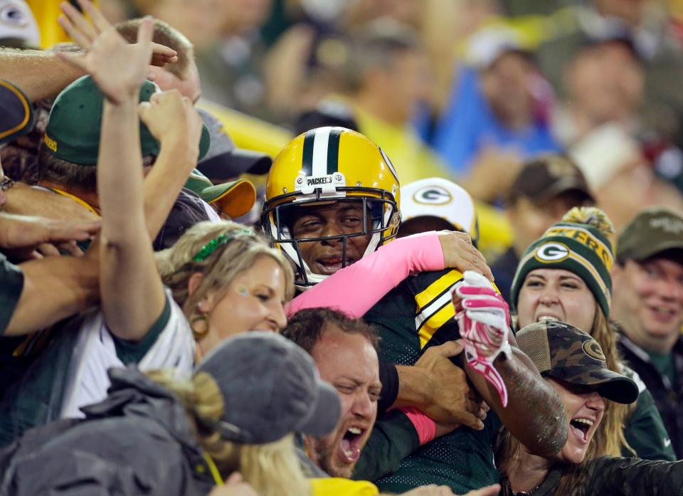 Green Bay Packers wide receiver Davante Adams (17) celebrates his touchdown during the Green Bay Packers-Minnesota Vikings NFL football game at Lambeau Field in Green Bay, Wisconsin, Thursday, October 2, 2014.