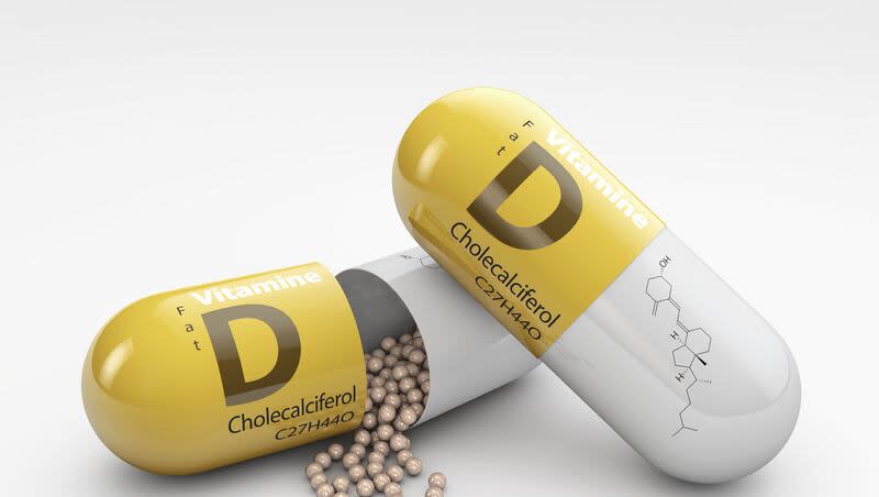 An illustration of capsule with vitamin D granules is pictured. According to a study published by Annals of Internal Medicine, vitamin D and calcium supplements might reduce risk of death from cancer but increase the risk of death from heart disease.