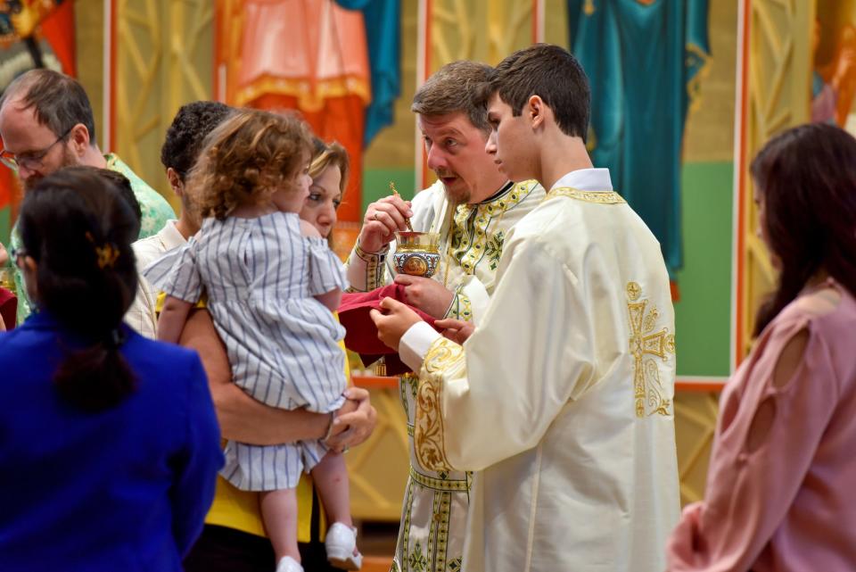 “In the sea of American culture, it was so important to hold on to the faith," said St. George's pastor, the Rev. Nicholas Belcher. "Faith was central to their life. It’s beautiful that, for 100 years now, it has endured."