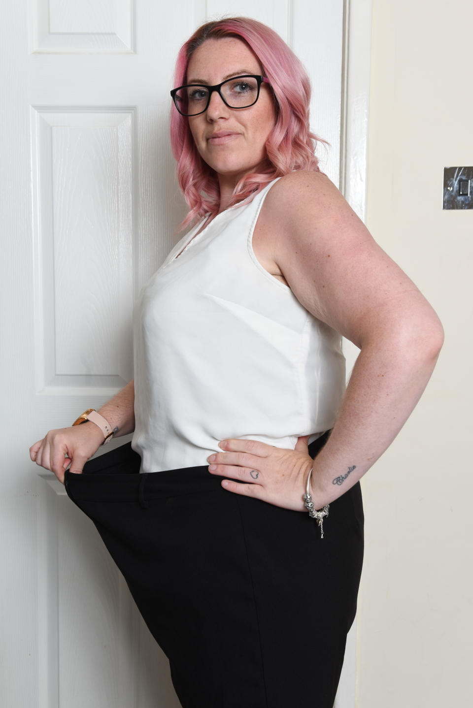  Ashleigh with an old pair of trousers) An obese bridesmaid has dropped six stone after a 'horrific' photo appeared online which made her look nine month pregnant. Ashleigh Bell, 32, says the photo changed her life and she suddenly realised that her size 24 waistline couldn't balloon any further. The mum-of-three spotted the photo on Facebook last July six months after her sisterâs wedding in 2018. Ashleigh says she felt 'mortified' by the awful image - which she says made her look pregnant - and actually apologised to her sister for being obese on her special day. SEE CATERS COPY