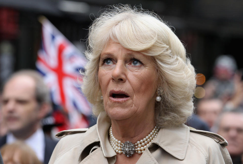 LONDON, ENGLAND - JUNE 03: Camilla, Duchess of Cornwall sings the National Anthem as she attends the 'Big Jubilee Lunch' in Piccadilly ahead of the Diamond Jubilee River Pageant on June 3, 2012 in London, England. For only the second time in its history the UK celebrates the Diamond Jubilee of a monarch. Her Majesty Queen Elizabeth II celebrates the 60th anniversary of her ascension to the throne. Thousands of well-wishers from around the world have flocked to London to witness the spectacle of the weekend's celebrations. The Queen along with all members of the royal family will participate in a River Pageant with a flotilla (Photo by Chris Jackson - WPA Pool/Getty Images)