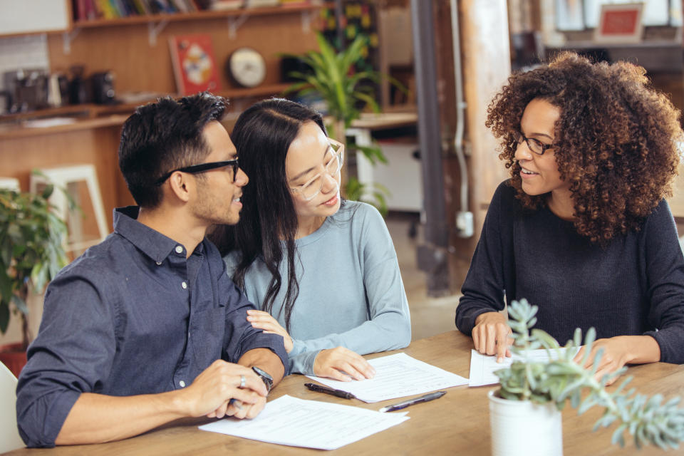 Couple meeting with lawyer