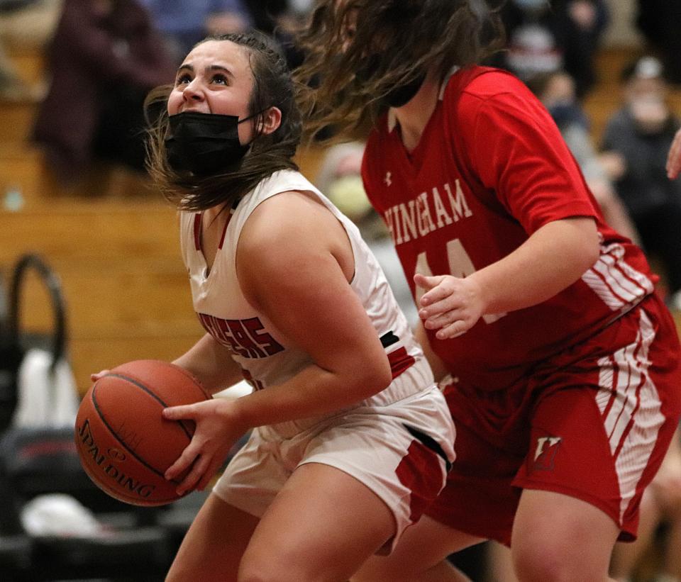 Whitman-Hanson's Katelyn Cirillo drives to the basket during a game against Hingham at Whitman-Hanson Regional High School on Friday, Jan. 21, 2022.