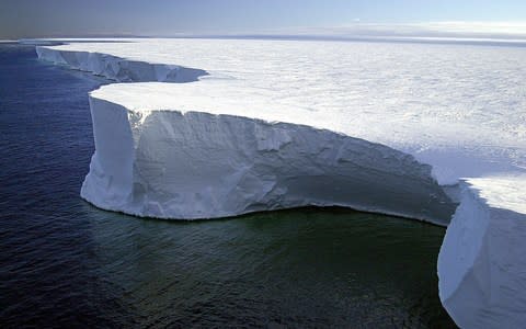 The shear face of the massive B-15A iceberg stretches for 150 kms across McMurdo Sound after it broke off the Ross Ice Shelf in Antartica, 2001. - Credit: AFP