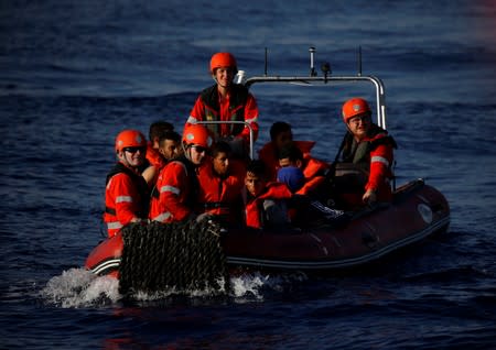 A RHIB of the German NGO Sea-Eye migrant rescue ship 'Alan Kurdi' carries migrants claiming to be Tunisians, after rescuing them in the central Mediterranean Sea