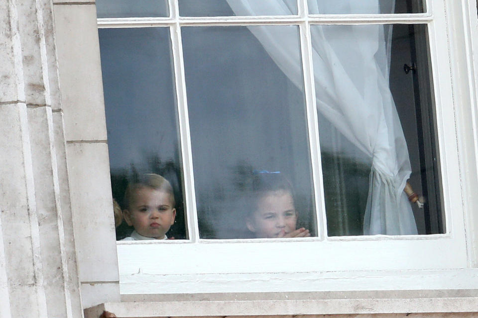 LONDON, ENGLAND - JUNE 08: Prince Louis and Princess Charlotte peer out of the windows of Buckingham Palace during Trooping The Colour, the Queen's annual birthday parade, on June 08, 2019 in London, England. (Photo by Chris Jackson/Getty Images)