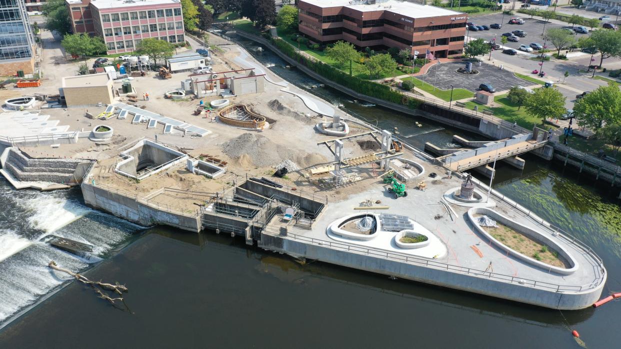 An aerial view of Seitz Park, across from the Century Center in downtown South Bend, captured this summer shows ongoing construction. Closed since August 2019, the park's reopening is delayed by several months because of aging river walls.