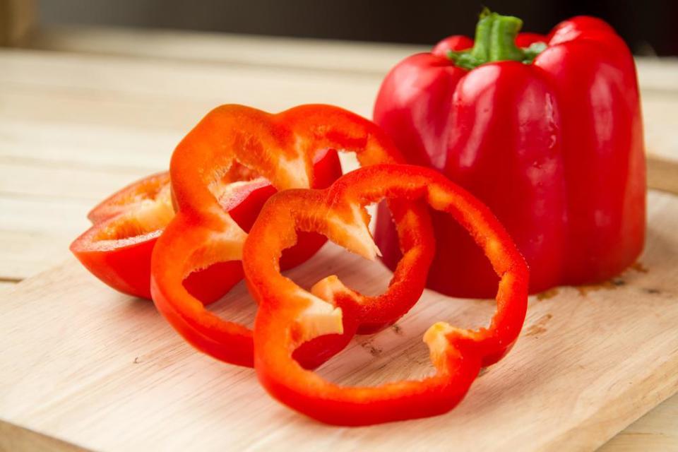 <p>Red bell peppers have 117 milligrams of vitamin C per cup, which makes them a colorful and delicious ingredient to pair with foods high in iron like beans and lentils or lean meat. They’re crunchy, sweet and make a perfect vehicle for hummus. Eating all the colors of the rainbow is a <a href="https://www.theactivetimes.com/healthy-living/habits-healthy-people/?referrer=yahoo&category=beauty_food&include_utm=1&utm_medium=referral&utm_source=yahoo&utm_campaign=feed" rel="nofollow noopener" target="_blank" data-ylk="slk:habit you should steal from people who never get sick;elm:context_link;itc:0;sec:content-canvas" class="link ">habit you should steal from people who never get sick</a>.</p>