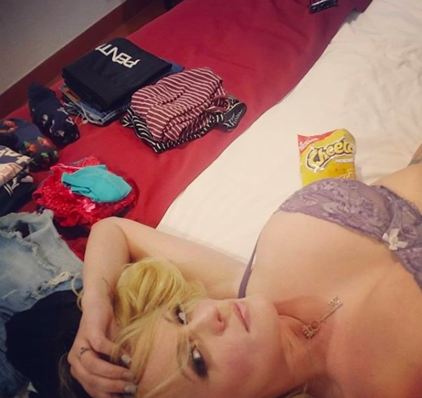 Stormy Daniels ended her Instagram Live broadcast by chowing down on a bag of Cheetos in an obvious dig at the president. (Photo: Stormy Daniels via Instagram)