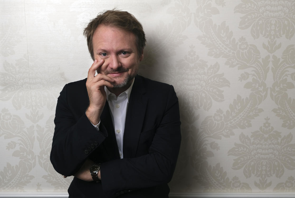 Rian Johnson, writer/director of the film "Knives Out," poses for a portrait at the St. Regis Hotel during the Toronto International Film Festival, Sunday, Sept. 8, 2019, in Toronto. (Photo by Chris Pizzello/Invision/AP)