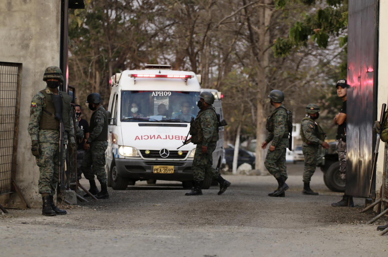 An ambulance leaves the Litoral Penitentiary after a prison riot, in Guayaquil, Ecuador, Wednesday, September 29, 2021. Authorities report at least 100 dead and 52 injured during the riot on Tuesday at the prison. (AP Photo/Angel DeJesus)