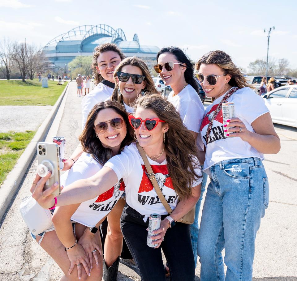 (Left to right, top row) Ashley Calore, Kacie Vezzosi, Chelsea Degnan, Kelli Brokaw, (Left to right, bottom row) Lindsay Walsh, Anna Palmer take a selfie before the Morgan Wallen concert at American Family Field on Friday April 14, 2023 in Milwaukee, Wis.