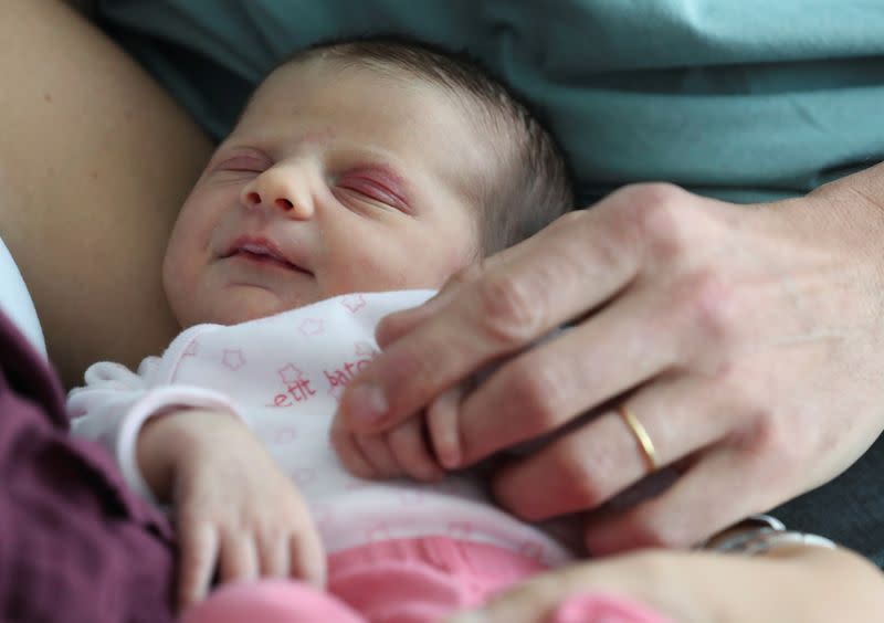 Newborn Mahaut, whose mother Amandine has been tested positive for the coronavirus disease (COVID-19) is pictured at the maternity at CHIREC Delta Hospital in Brussels,