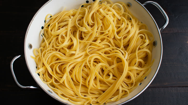 cooked linguine drained in colander