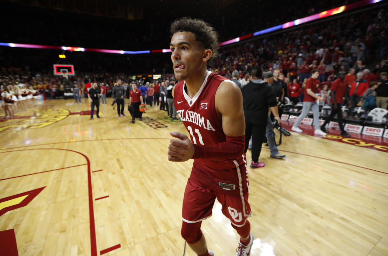 Oklahoma guard Trae Young runs off the court at the end of an NCAA college basketball game against Iowa State, Saturday, Feb. 10, 2018, in Ames, Iowa. Iowa State won 88-80. (AP Photo/Charlie Neibergall)