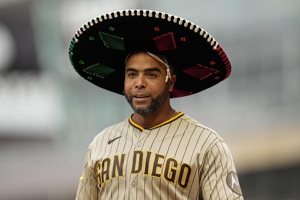 San Diego Padres' Nelson Cruz wears the team's home-run sombrero before a baseball game against the Minnesota Twins, Tuesday, May 9, 2023, in Minneapolis. (AP Photo/Abbie Parr)