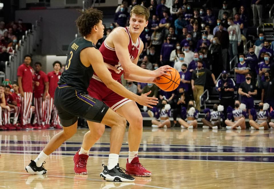 Feb 8, 2022; Evanston, Illinois, USA; Northwestern Wildcats guard Ty Berry (3) defends Indiana Hoosiers forward Miller Kopp (12) during the first half at Welsh-Ryan Arena. Mandatory Credit: David Banks-USA TODAY Sports