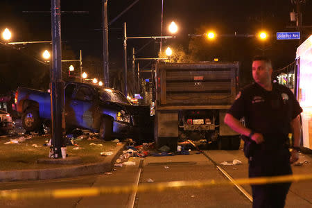 A vehicle is seen crashed along the Endymion parade route at Orleans and Carollton during Mardi Gras in New Orleans, Louisiana U.S., February 25, 2017. REUTERS/Shannon Stapleton