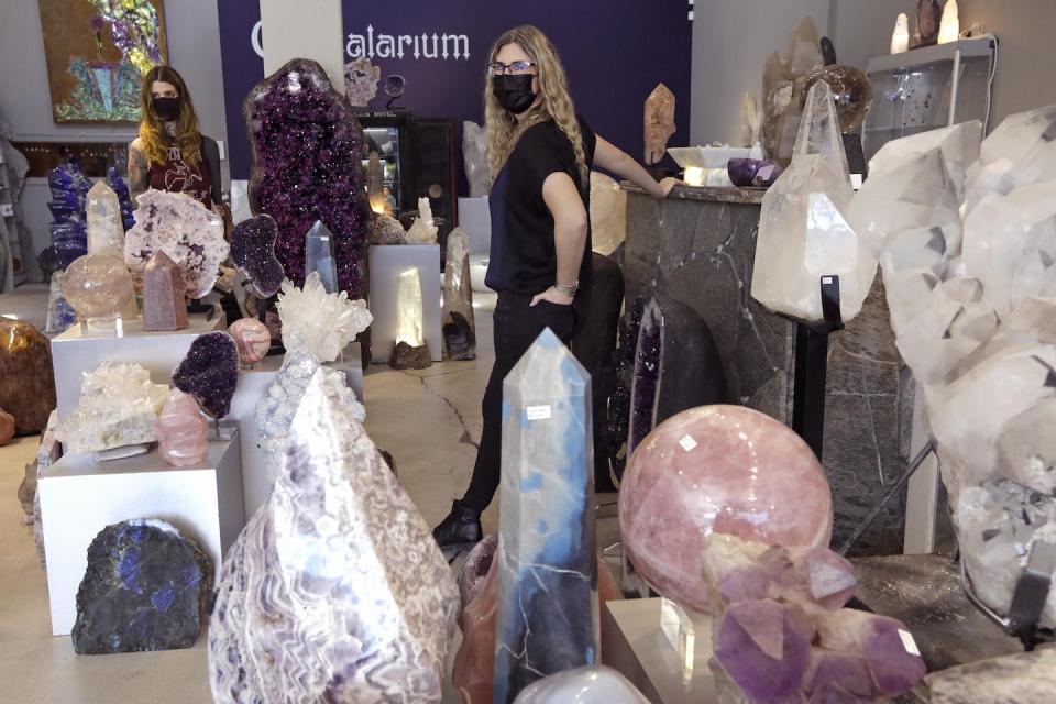 Crystal sales soared during the pandemic. <a href="https://www.gettyimages.com/detail/news-photo/cheryl-rey-center-manager-of-the-crystalarium-and-abby-news-photo/1234406149?adppopup=true" rel="nofollow noopener" target="_blank" data-ylk="slk:Genaro Molina/Los Angeles Times via Getty Images;elm:context_link;itc:0;sec:content-canvas" class="link ">Genaro Molina/Los Angeles Times via Getty Images</a>