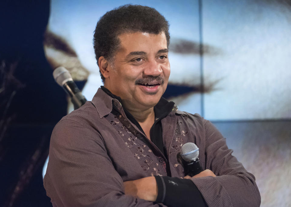 FILE - In this Nov. 1, 2017 file photo, Neil deGrasse Tyson attends a fan event celebrating the release Kelly Clarkson's album "Meaning of Life" at YouTube Space New York in New York. A museum spokesman said in a statement Thursday, July 25, 2019, the astrophysicist will keep his job as head of the Hayden Planetarium at New York's American Museum after the museum concluded its investigation into sexual misconduct charges against him. (Photo by Charles Sykes/Invision/AP, File)